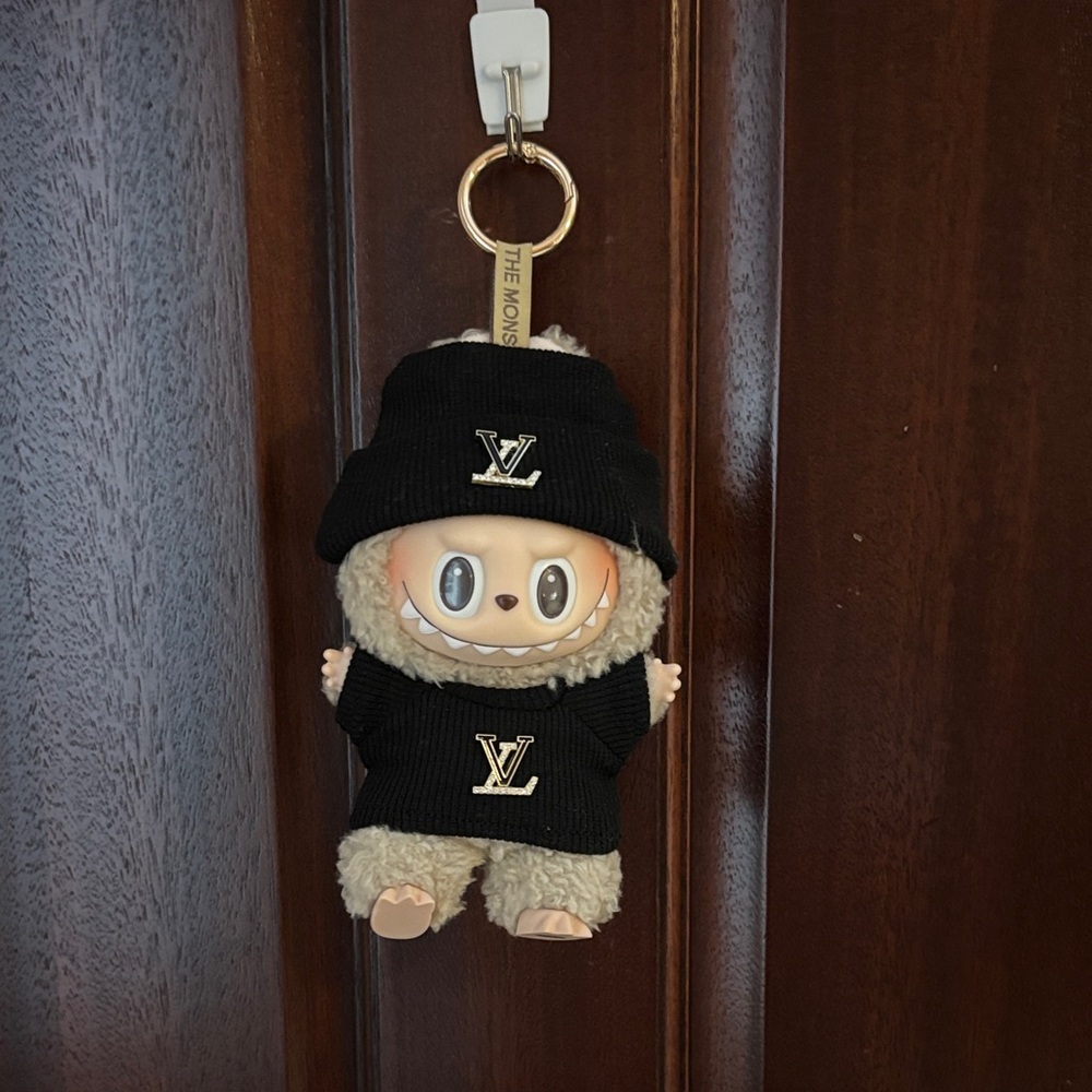 Labubu doll with Louis Vuitton outfit
